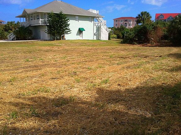 West to east view of the lot and abutter
