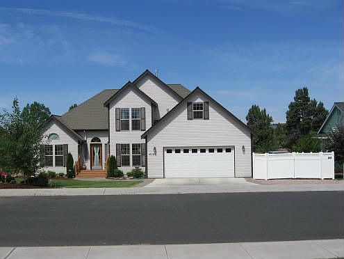 Two story contemporary with enclosed RV parking