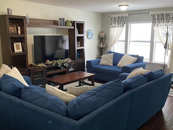 Large family room with plenty of room for gathering.