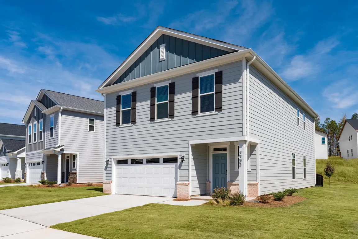 A stylish single-family home at Amavi Brier Creek, offering private living in Durham with easy access to Brier Creek's shopping, dining, and employers.