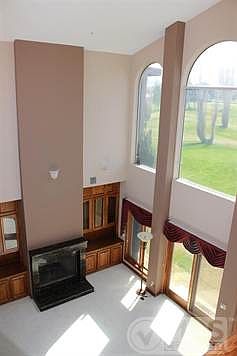 Formal living room with high ceilings