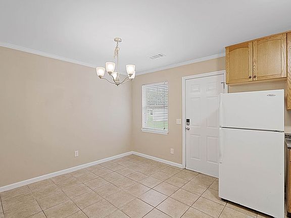 Dining with tile flooring