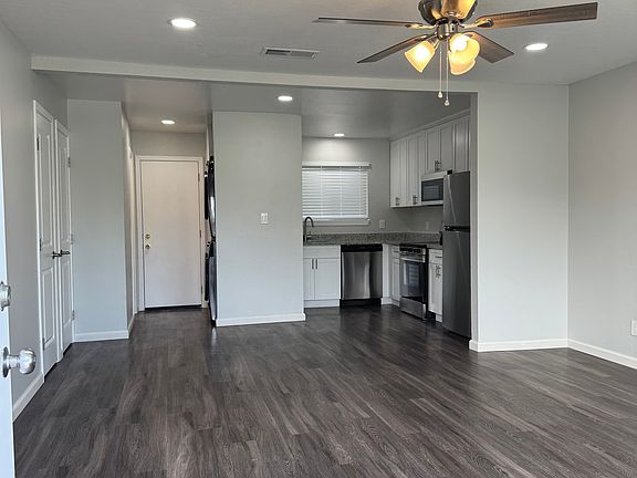 Unit has been fully renovated. Living room has new flooring, new blinds and fresh paint.