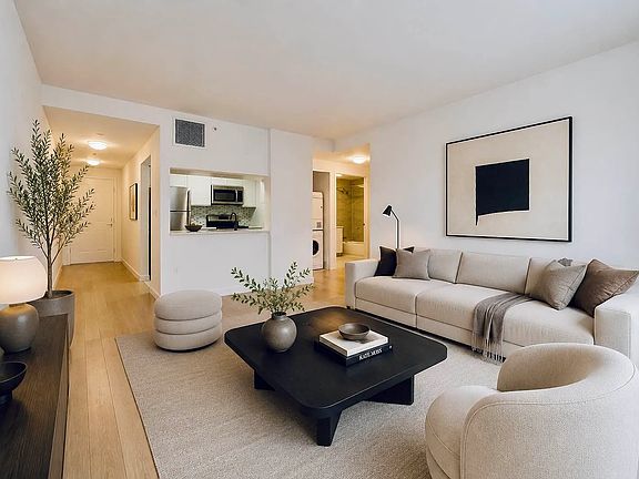 2nd image of 310 E 2nd St APT 3D