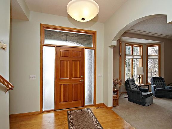 Large, beautiful entry with cathedral ceilings and hardwood floors