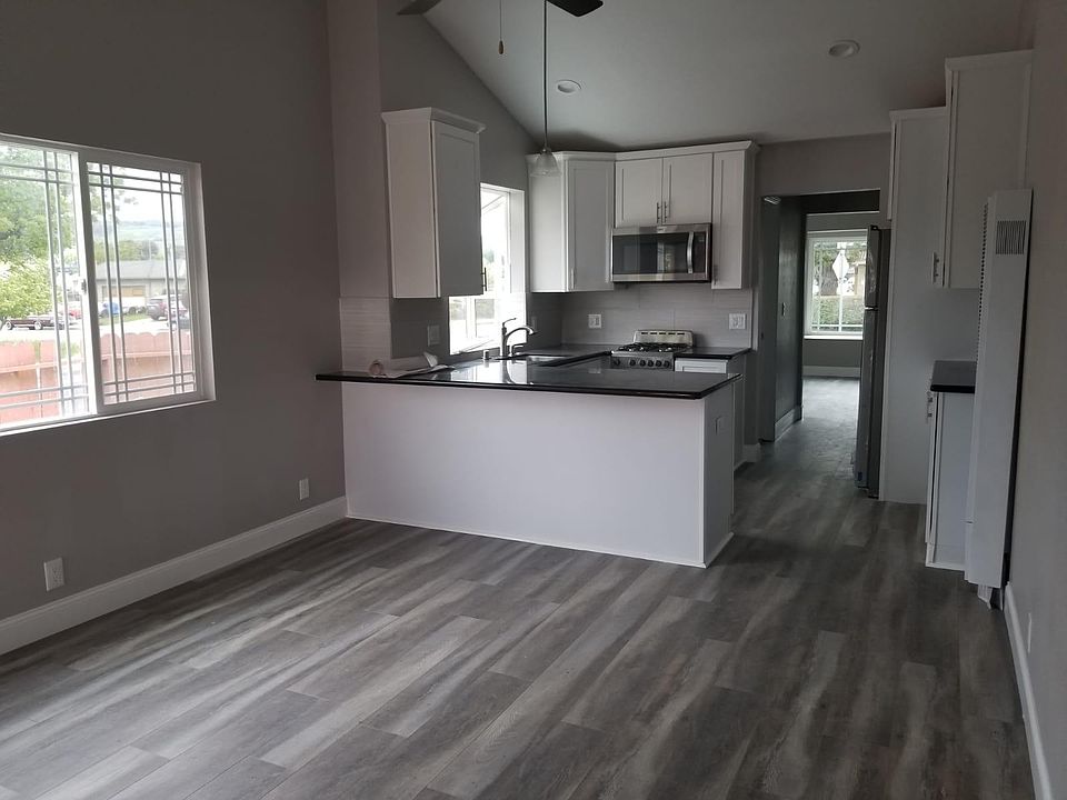 Living room with open layout kitchen 