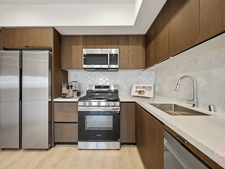 Open-Kitchen with Stainless-Steel Refrigerator, Stove with Griddle Top, Microwave Oven, and Dishwasher - Stevie Floor Plan