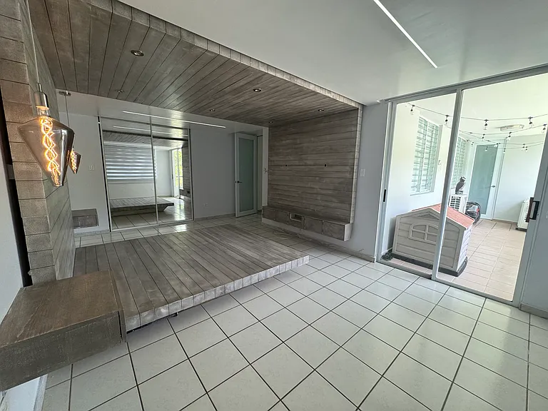 Master bedroom with view of second floor balcony