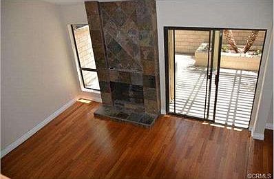 Large family/living room space with vaulted ceilings, slate fire