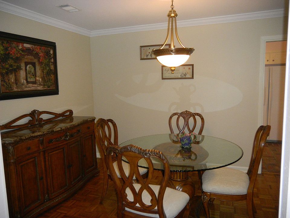 Large formal dining room gives house such a spacious feeling.
