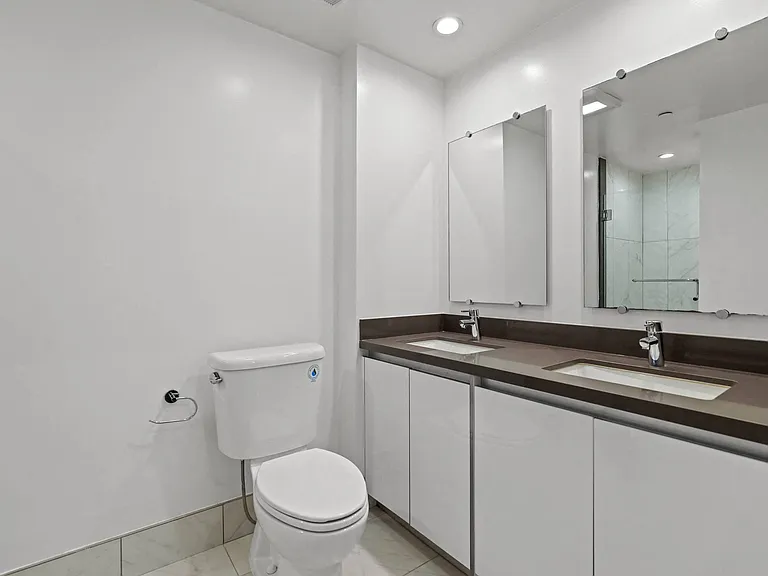 Bathroom with Double-Sink Vanity and Cabinet Storage