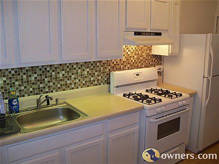 Newer stove and fridge.