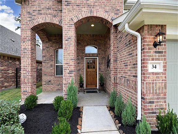 A welcoming front porch invites a place to sit and enjoy.