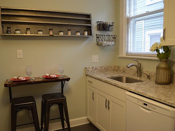 Completely kitchen. Walnut bar with live edge. Bar stools included.