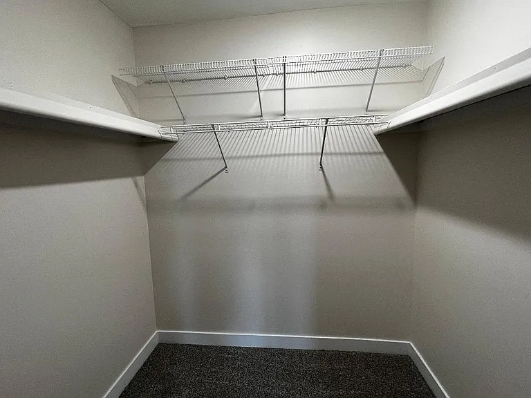 Upstairs bedroom walk in closet