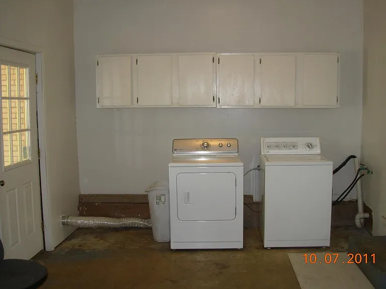 Utility Room with Furnished Washer & Gas Dryer