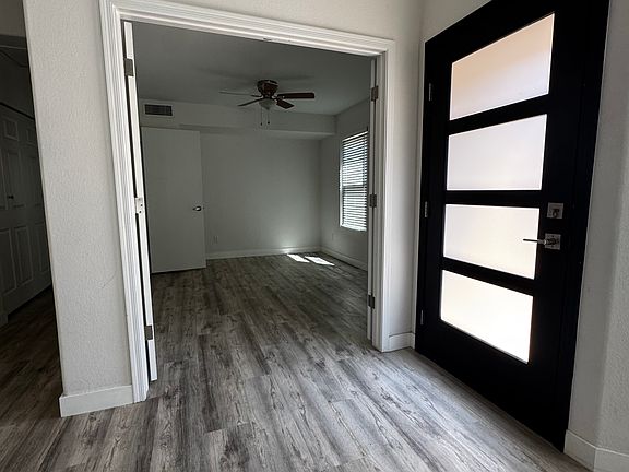 Front Entry with New Door and Den