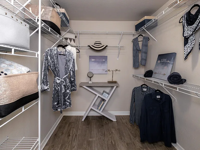 Step into our surreal primary bedroom walk-in closets, meticulously crafted with custom built-in organizers a true walk-in utopia!