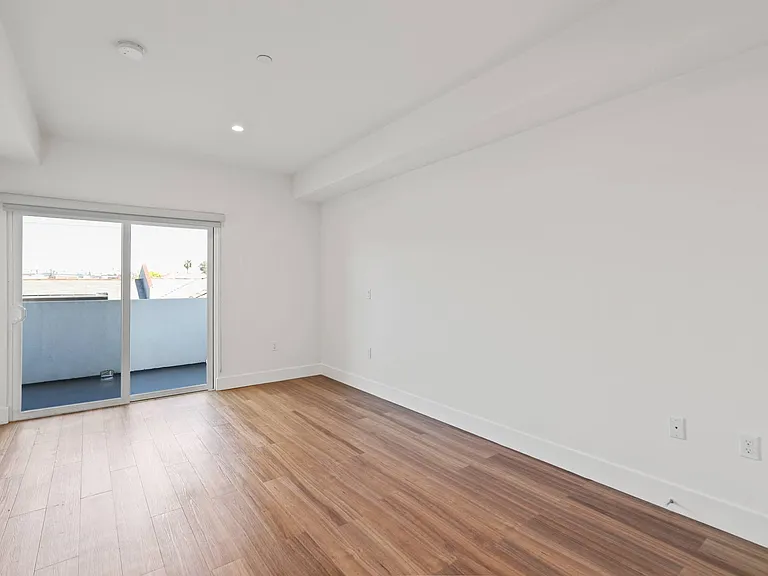 Living Room with Recessed Lighting, Vinyl Flooring, and Patio
