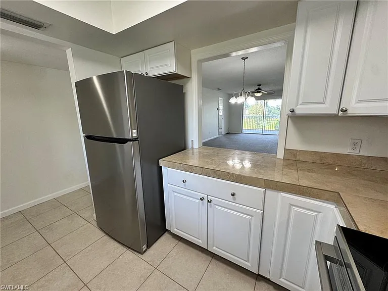 5667 Rattlesnake Hamm Rd N #B-301 — Photo 7
