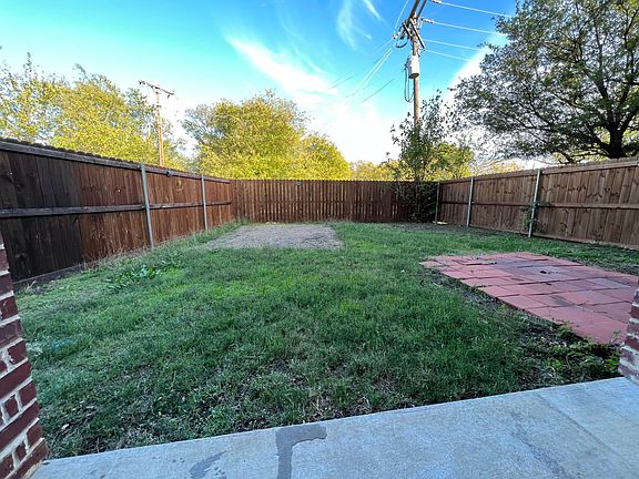 Fenced backyard (east side)