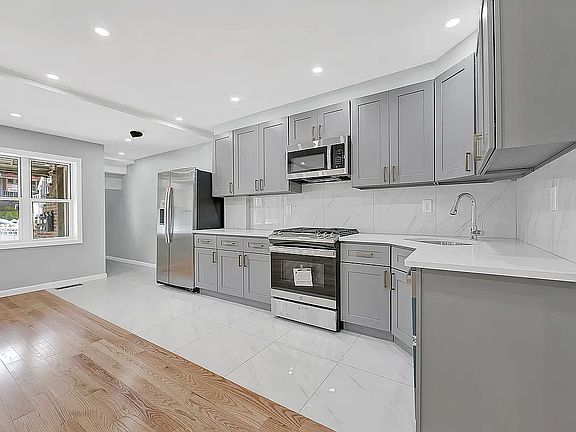 2nd image of 928 E 106th St Floor 2
