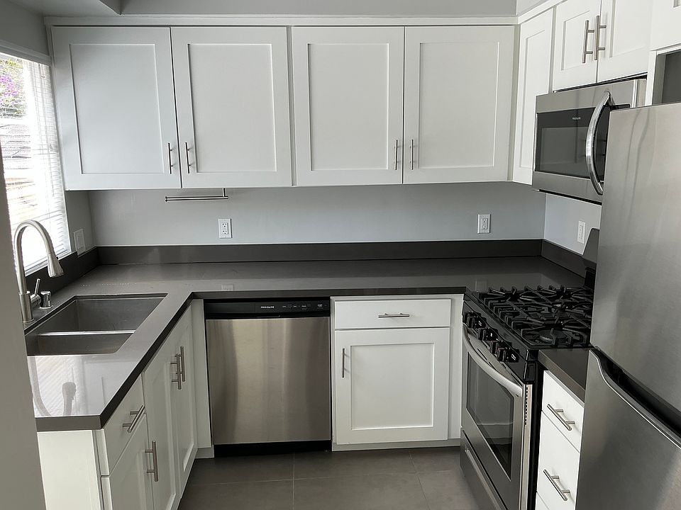 Recently upgraded kitchen with well appointed appliances through out, as well as ample storage and counter top space.