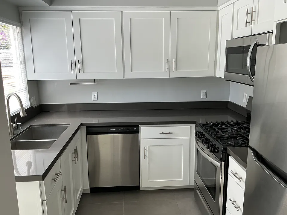 Recently upgraded kitchen with well appointed appliances through out, as well as ample storage and counter top space.