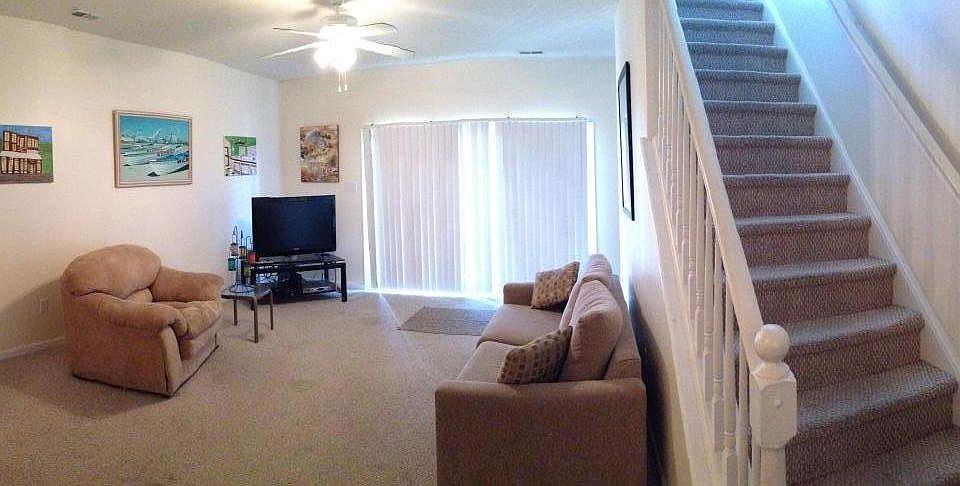 Living room on main floor. Furniture and TV not included.