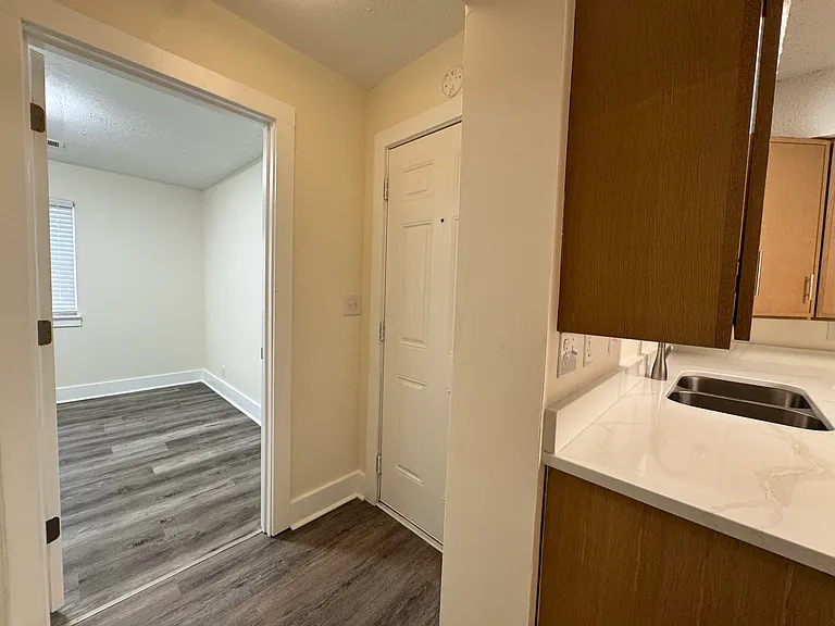 hall to back door / bedroom 3