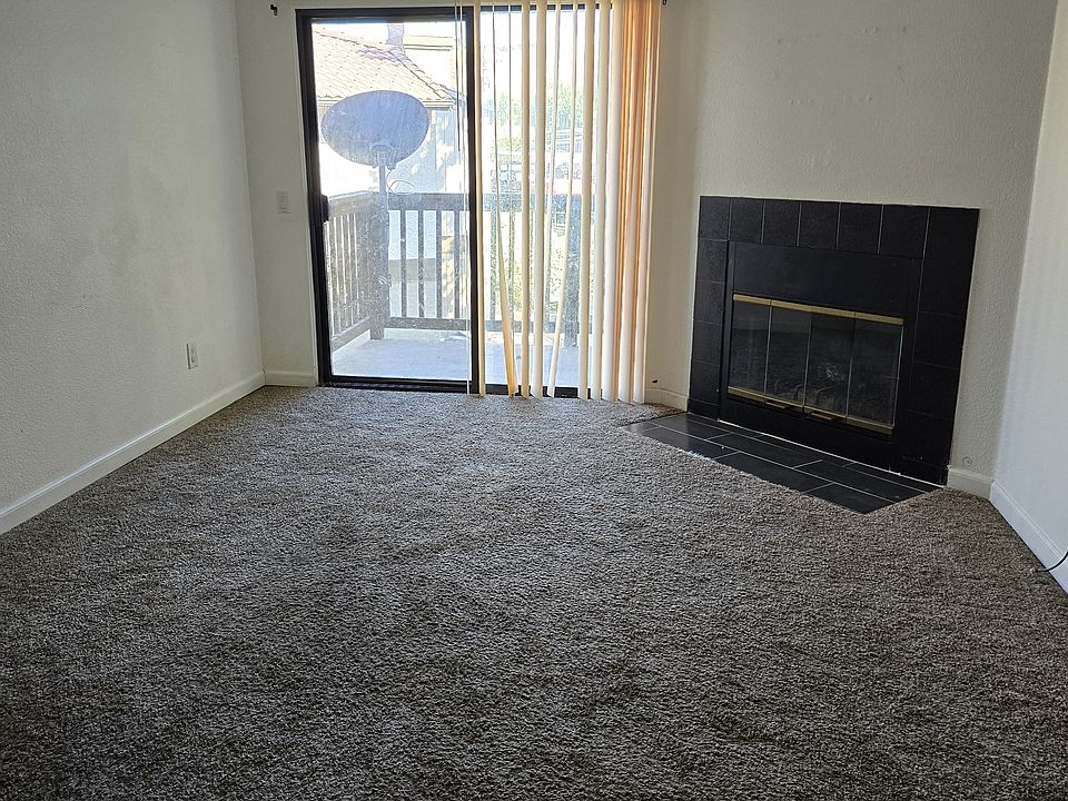 Fireplace for comfort and a large patio overlooking the lawn