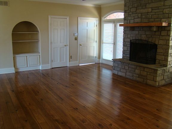 living room with wood fireplace