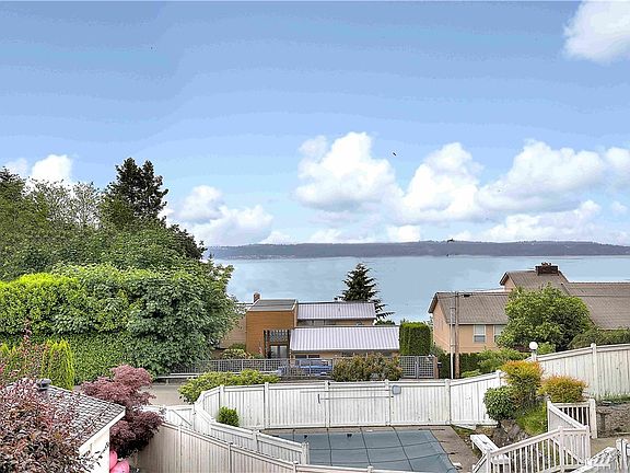 Enjoy Puget Sound, Maury Island and Olympic Mountain views.