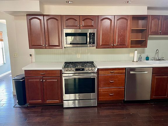 Roomy kitchen with stainless new appliances