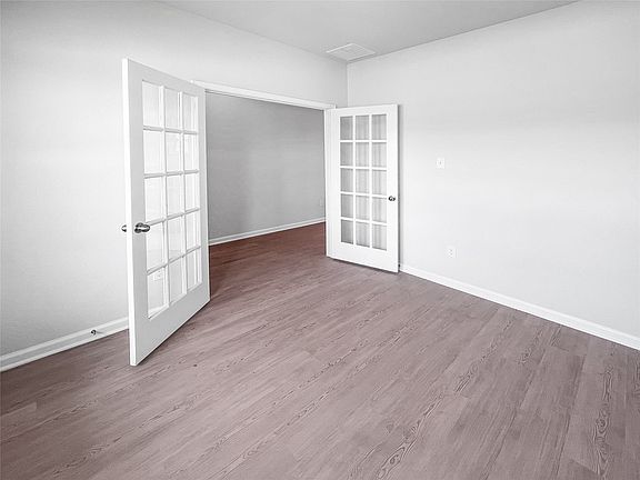 The Waring III- Study with French doors.l Sample image for illustration upgrades, options, and col