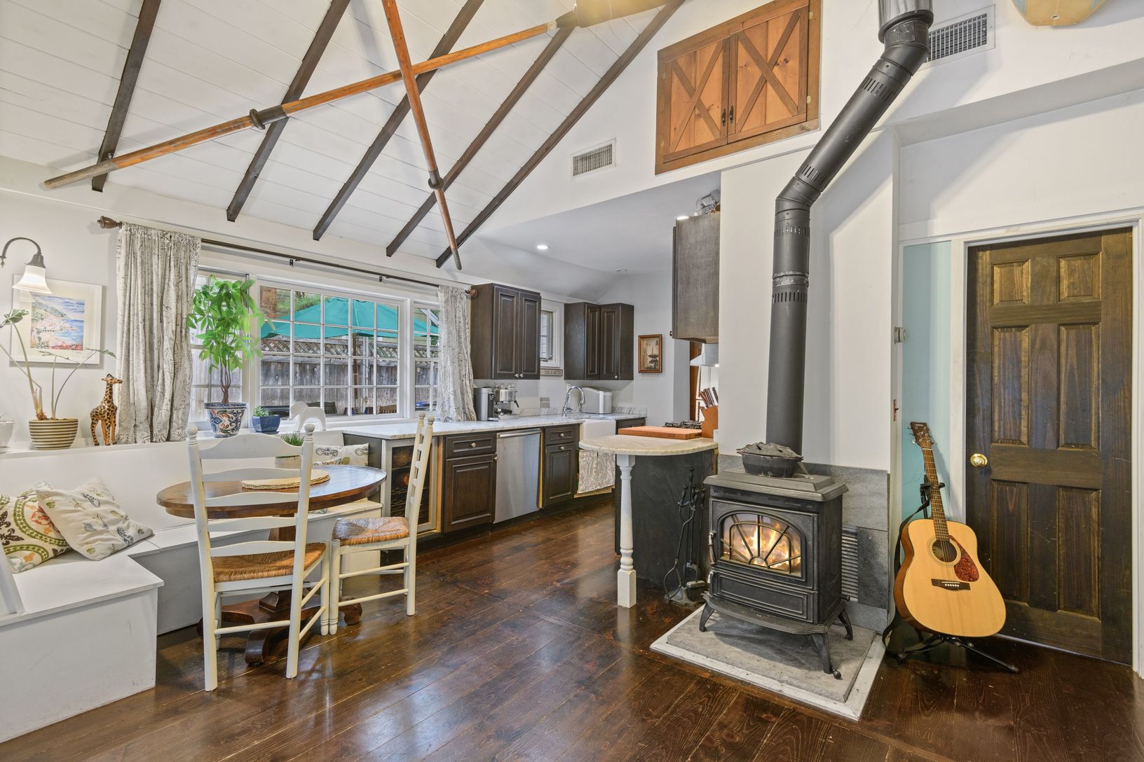  Open  layout and central wood burning stove