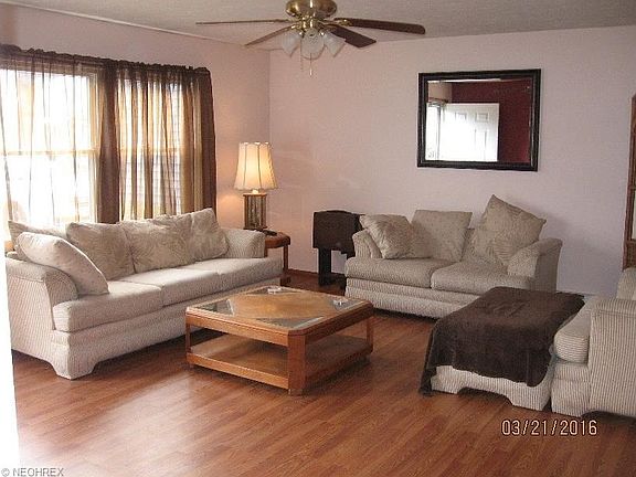 Big, bright and freshly painted living room makes a great place to lounge, relax, play games or hang out. This room would also make a nice formal dining room. New laminate flooring was installed at the end of 2015.