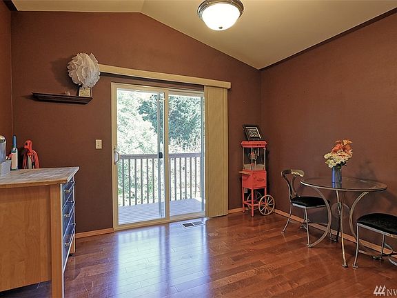 Dining room with a slider out to a private deck