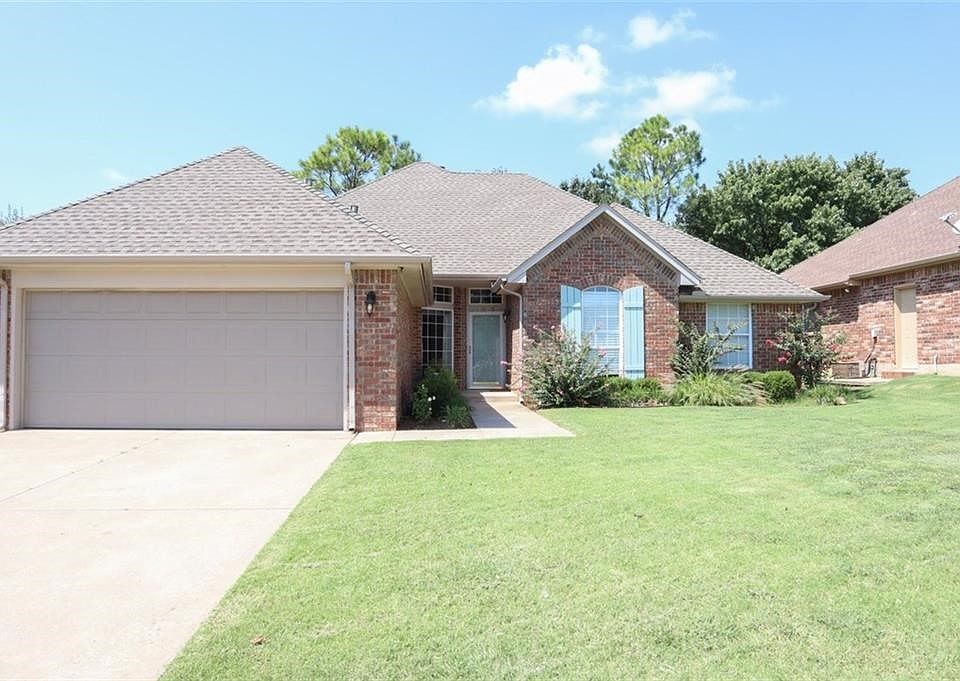 The front of the home faces east but the backyard is wooded!