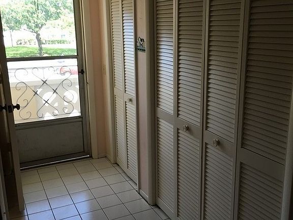Entrance to Condo with Closet and Pantry