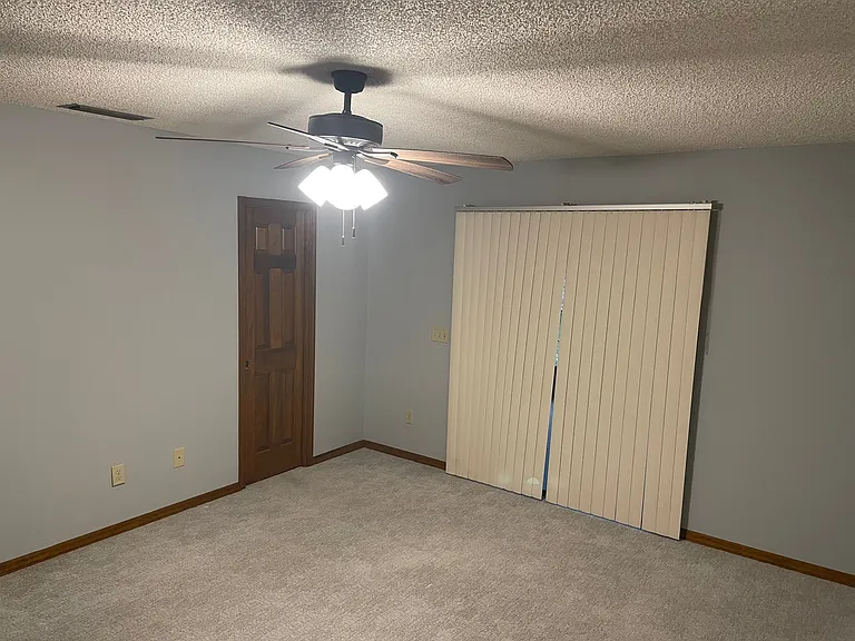 Master bedroom w/slider and master bath