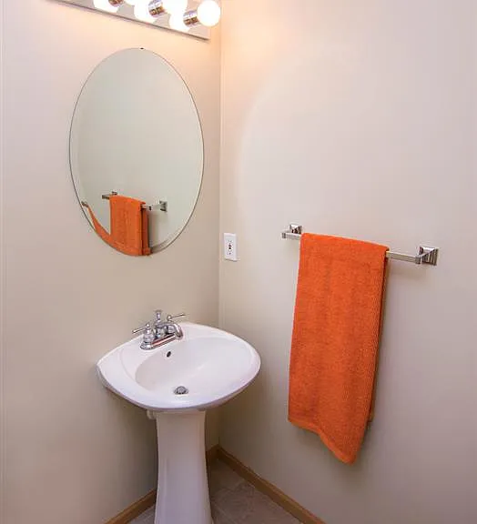 The main floor features a convenient half bath.