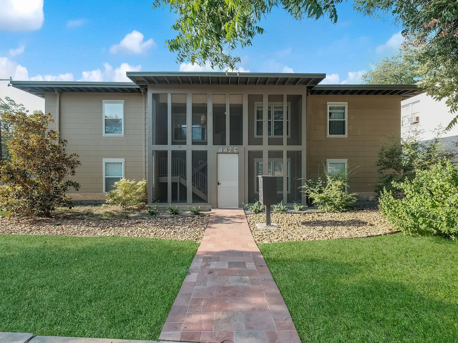 Spacious Mid-Century Charmer with Screened-In Balcony — Photo 1
