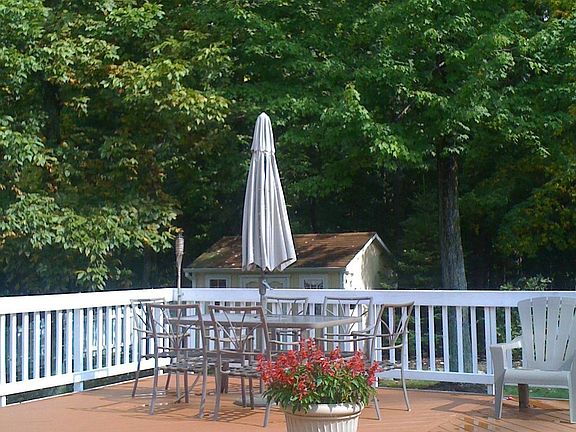 Rare wooded city lot with large deck