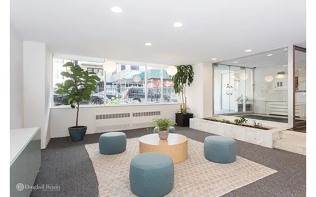 Sold by Douglas Elliman | media 11