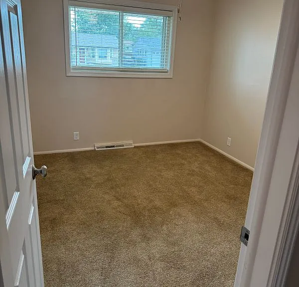 Bedroom 1 upstairs with ceiling fan