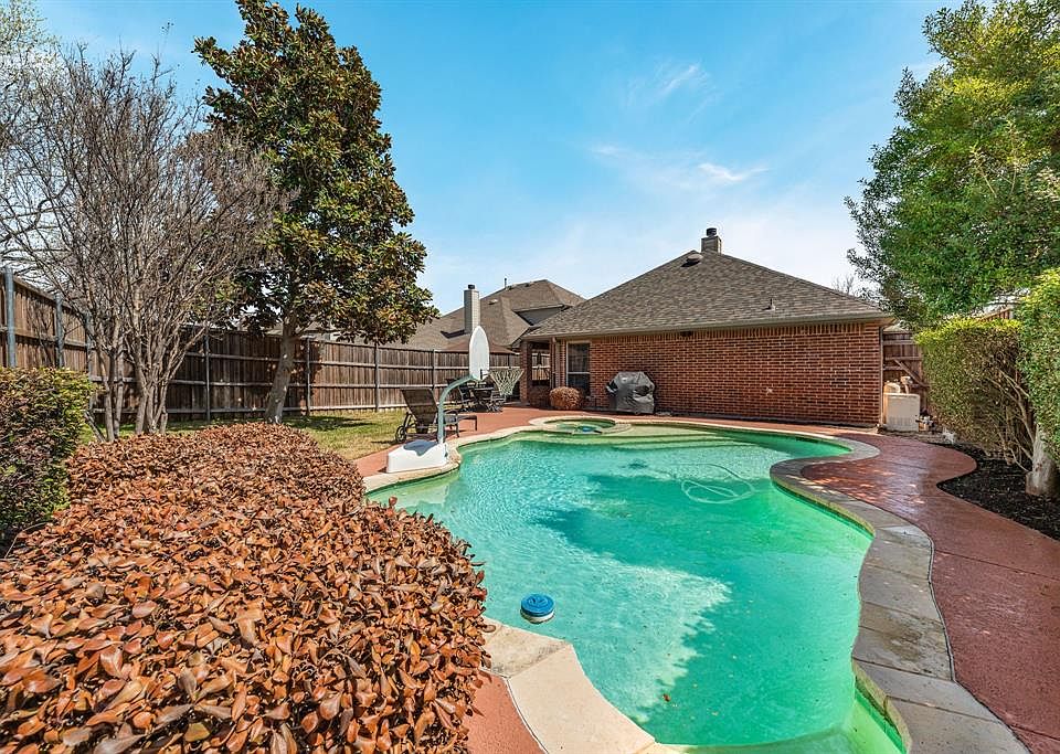 Enjoy this beautiful backyard oasis with summer just around the corner.