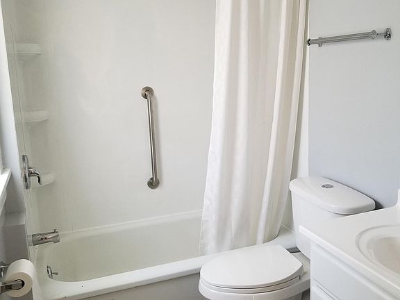 2nd floor bathroom with shower and tub