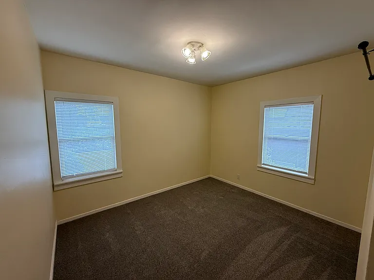 Northeast bedroom with north and east-facing windows
