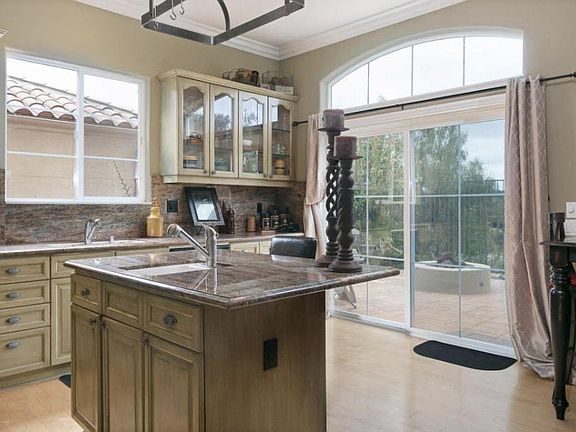 Kitchen with island and extra sink